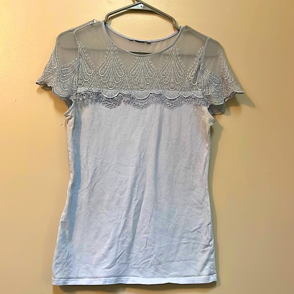 Soft blue, lacey top